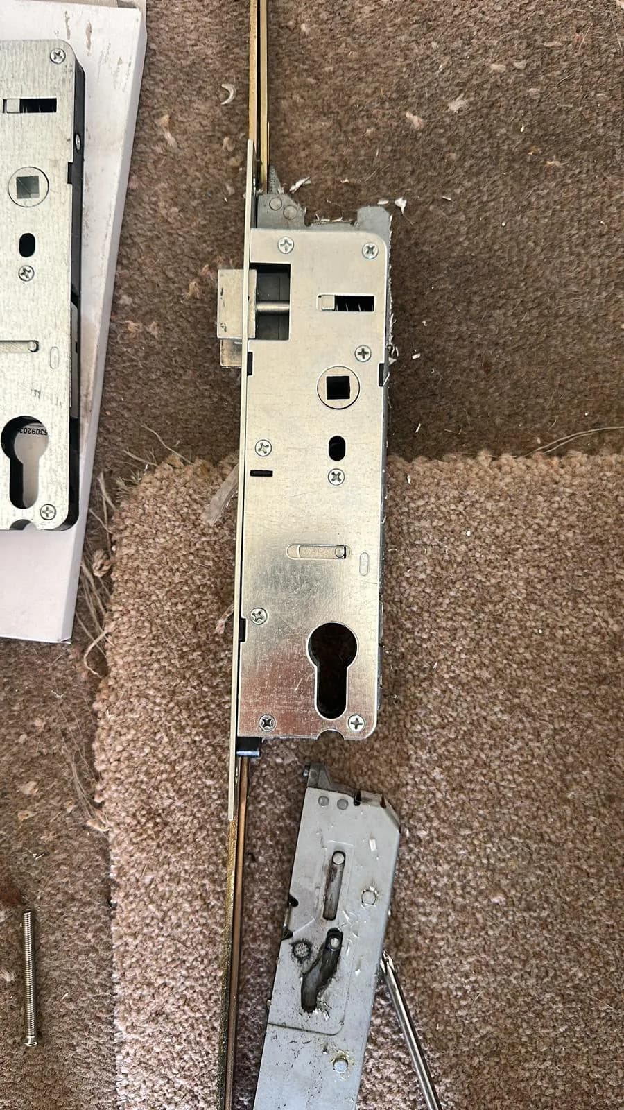 Removed multipoint lock case laid on a floor